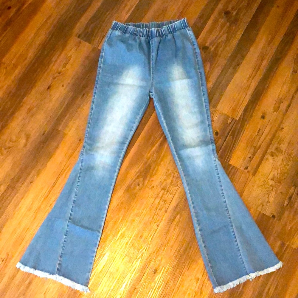 Never worn. Small blue jean flares/bell bottoms.